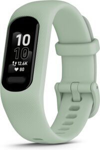 a Garmin Vivosmart 5 in mint green