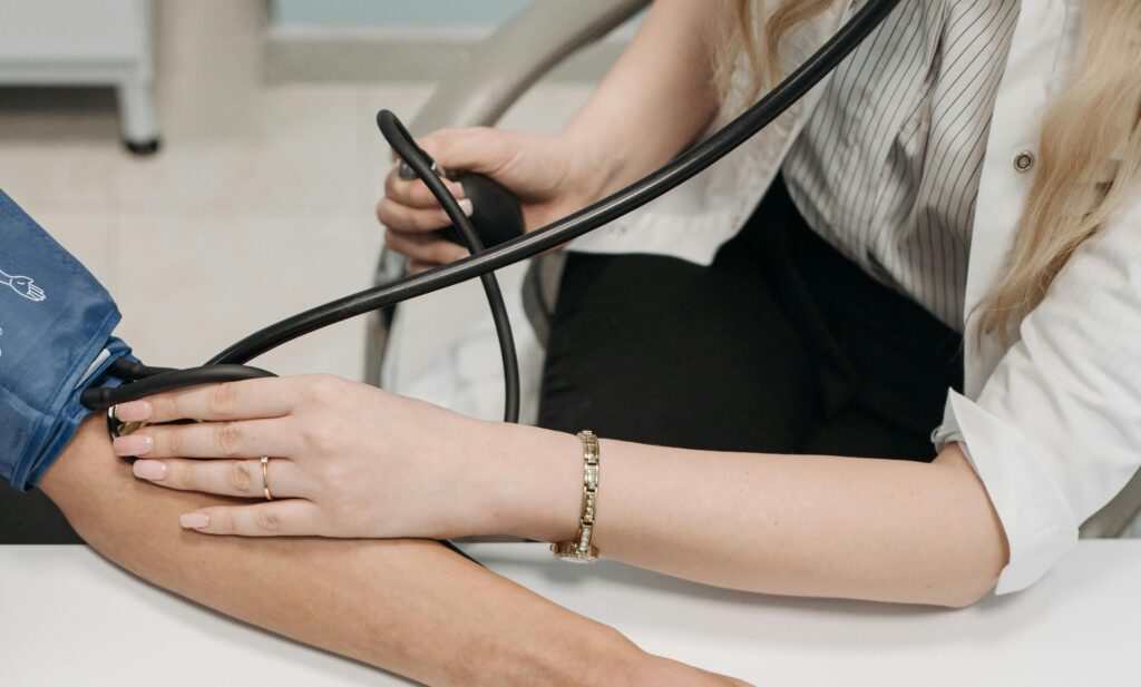 a doctor checking blood pressure